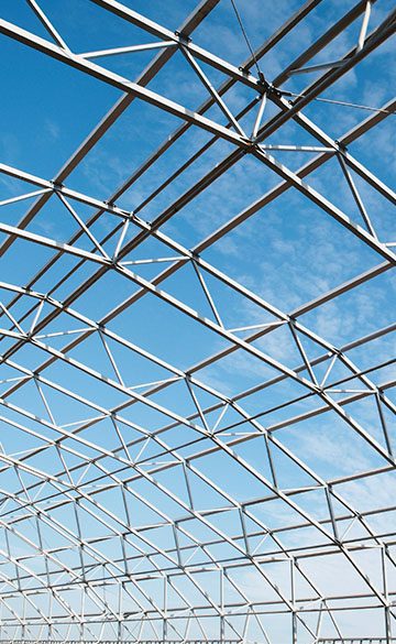 A metal structure with blue sky in the background.
